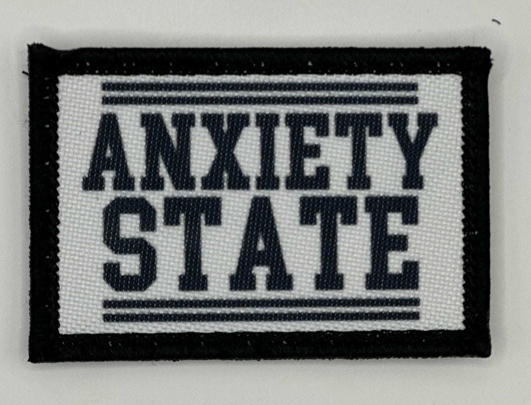 a black and white patch that says,&#39;anxiety state &#39;