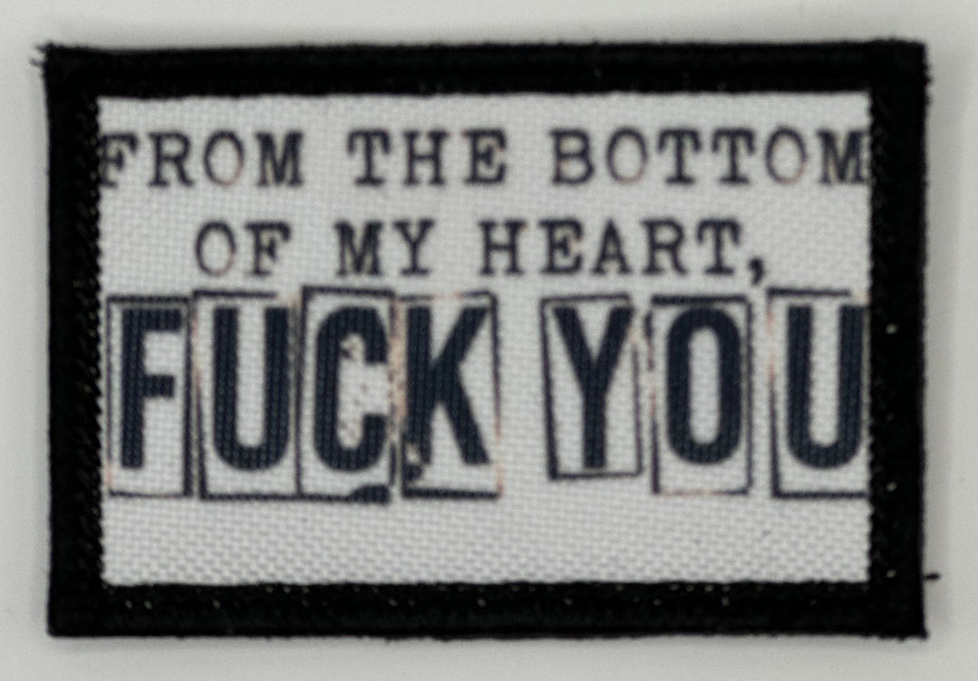 a black and white patch with words on it