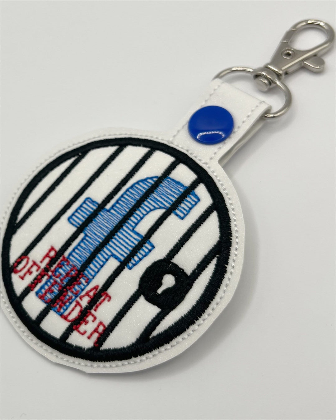 Keychain representing Facebook Jail