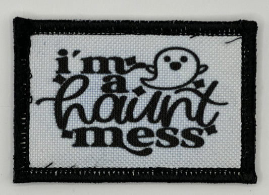 a black and white patch with the words i&#39;m a round mess on it