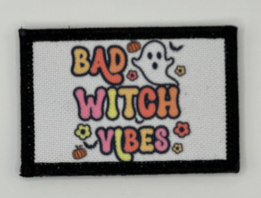 a black and white patch with the words bad witch vibes