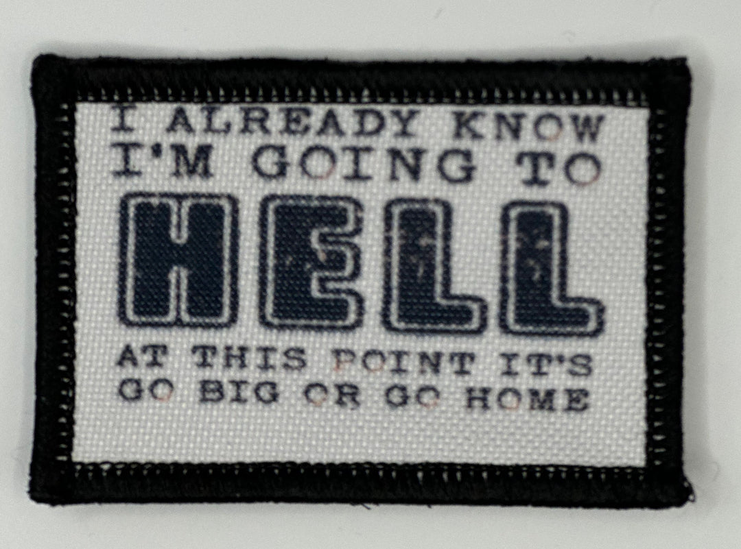 a black and white patch with words on it