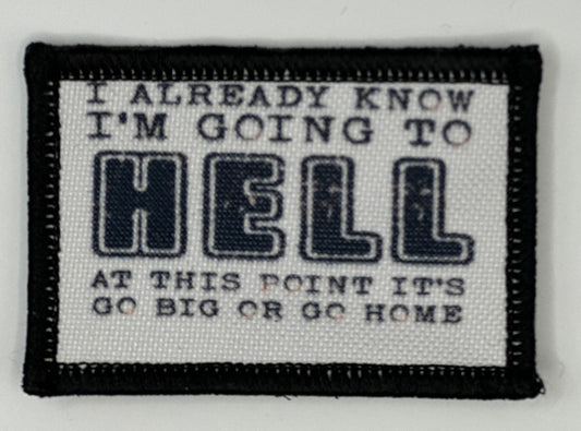 a black and white patch with words on it