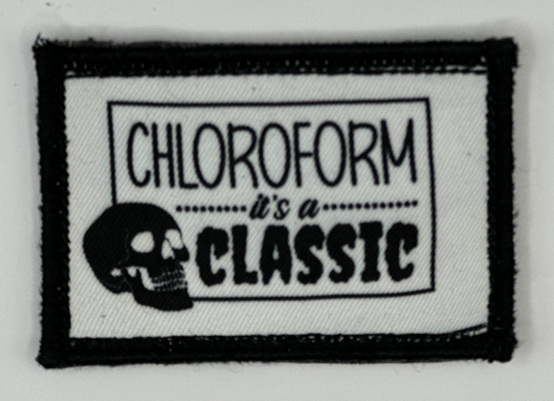 a black and white patch with a skull on it