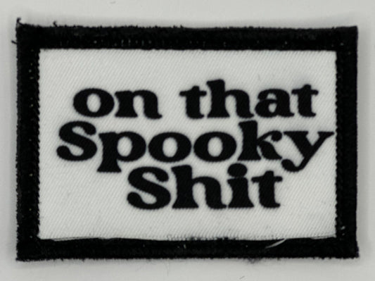 a patch that says on that spooky shit