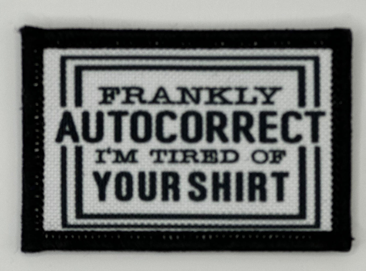 a black and white patch that says, frankly auto correct i&#39;m tired