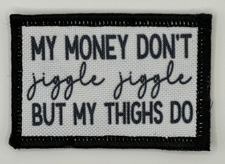 a black and white patch that says, my money don&#39;t judge juggle