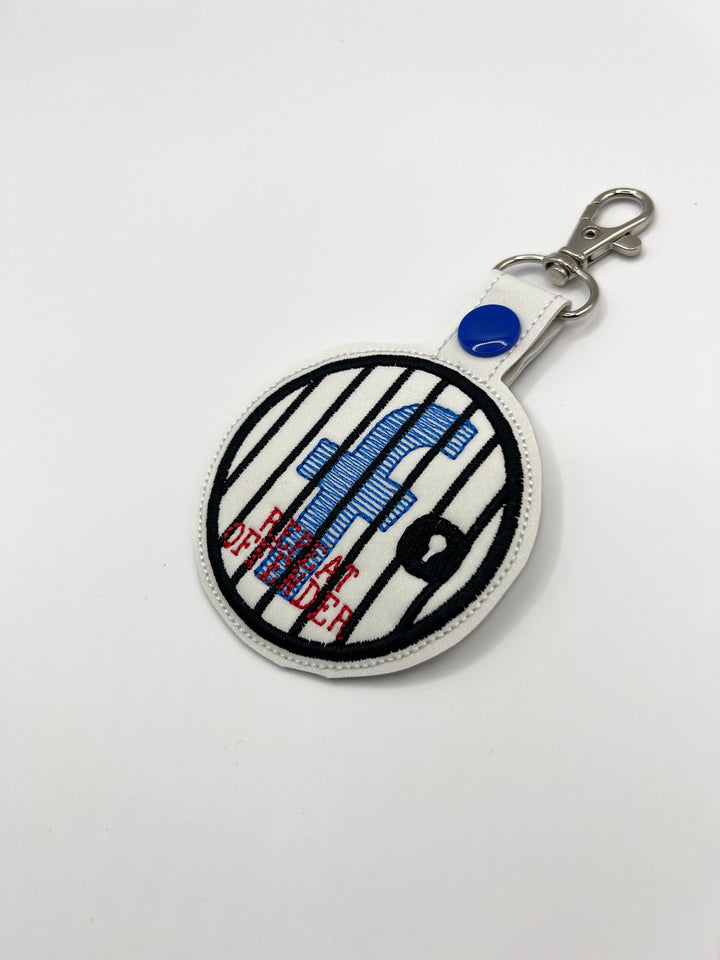 Keychain representing Facebook Jail