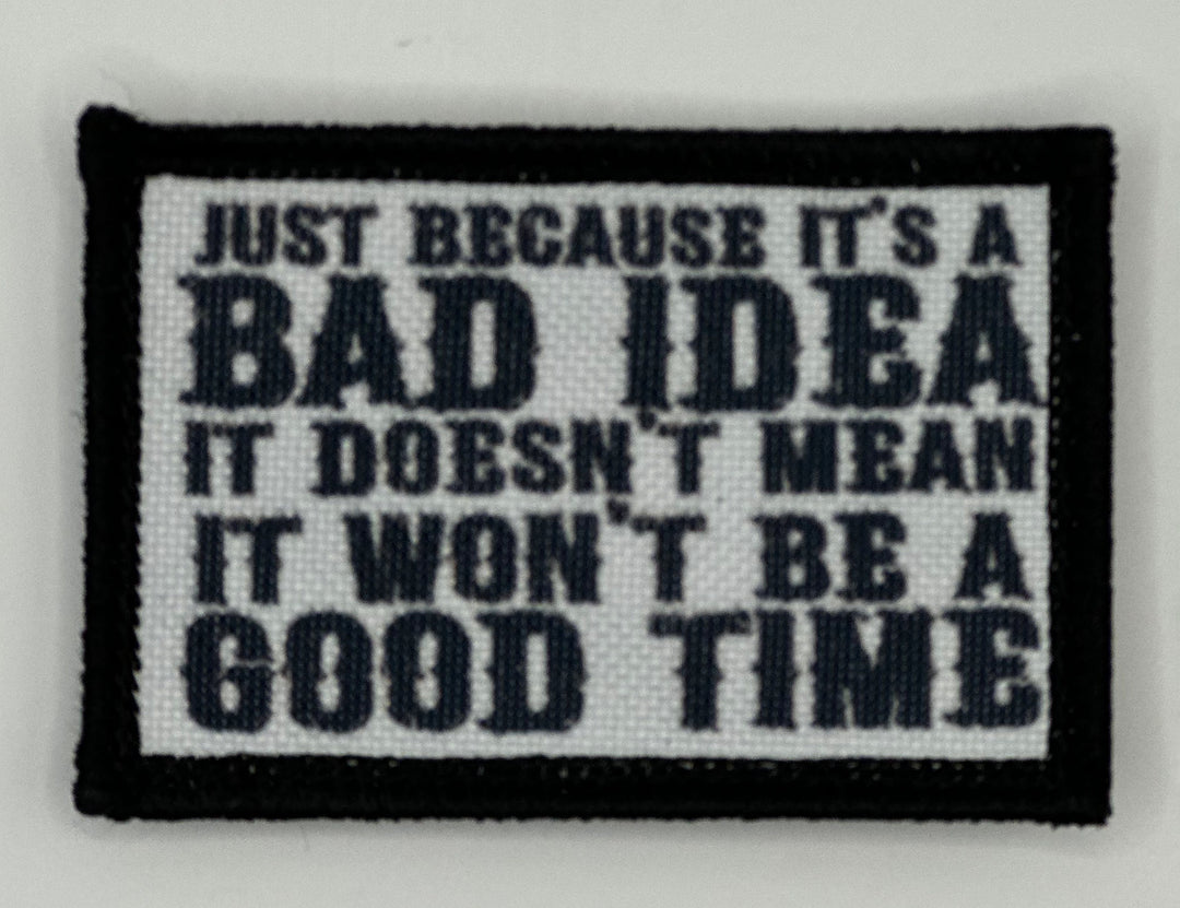 a black and white patch with a quote on it