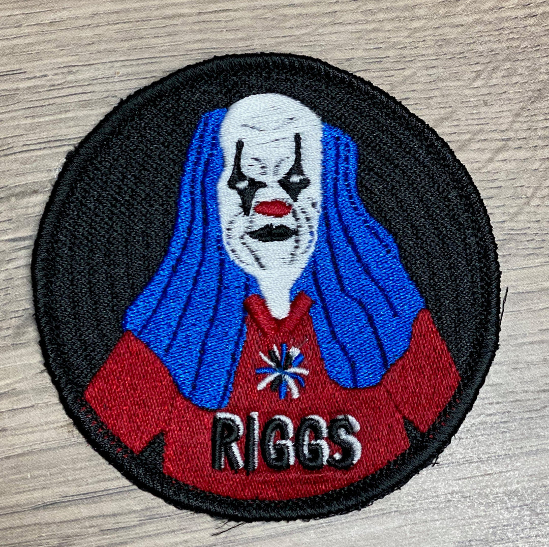 Embroidered patch with blue hair clown and Riggs