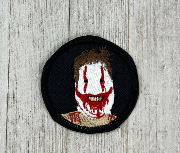 Embroidered Patch with Smiley Character on it