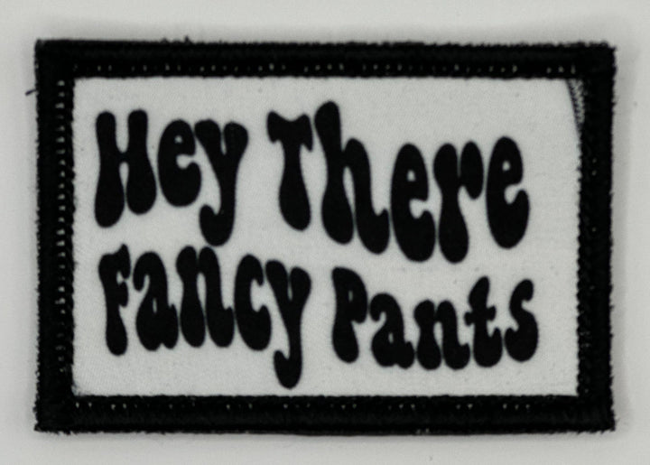 a patch that says hey there fancy pants