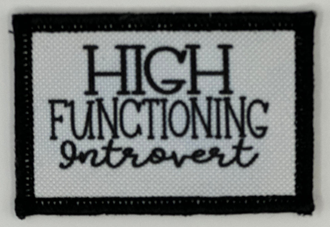 a black and white patch with the words high functioning