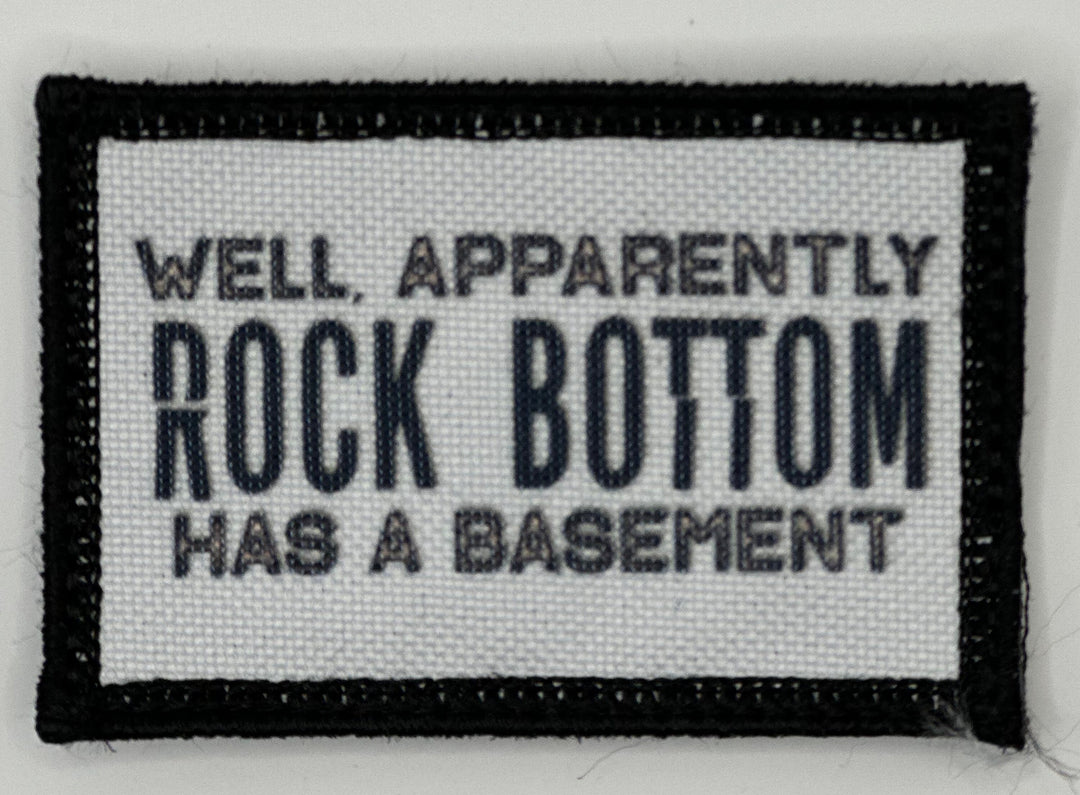 a patch that says well apparently rock bottom has a basement