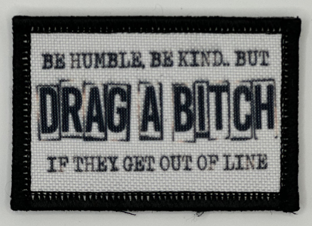 a white and black patch with words on it