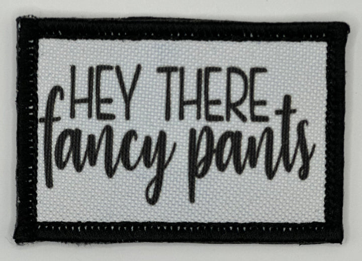 a patch that says hey there fancy pants