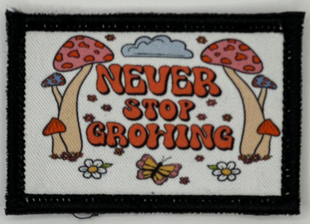 a patch that says never stop growing