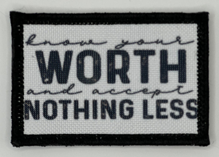 a black and white patch that says, know your worth and accept nothing less