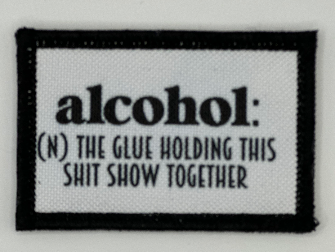 a black and white patch with the words alcohol on it