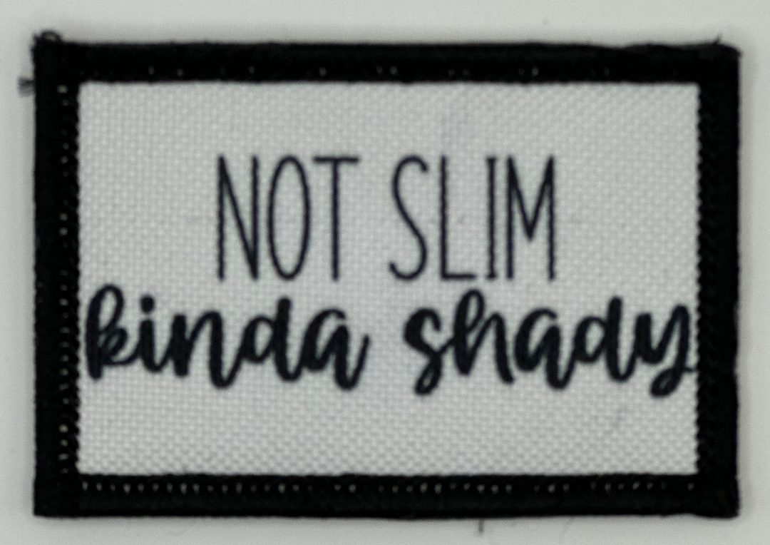 a black and white sign that says not slim, binda shaay