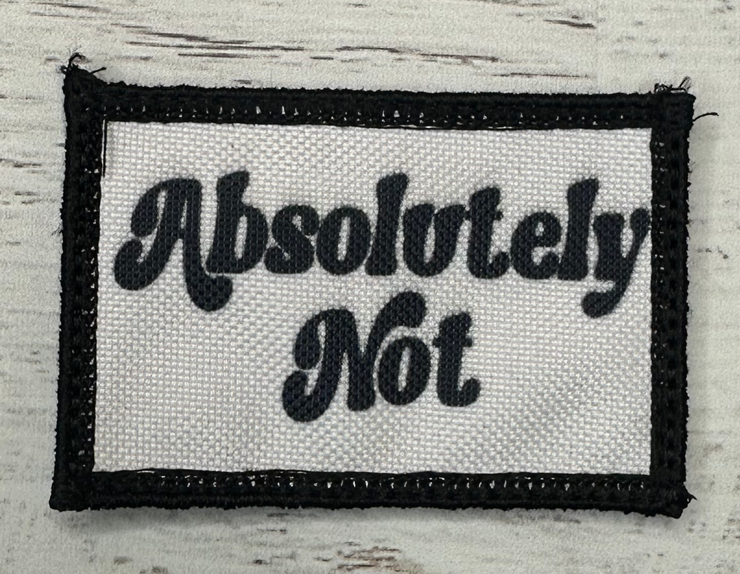 a patch with the words absolutely not on it