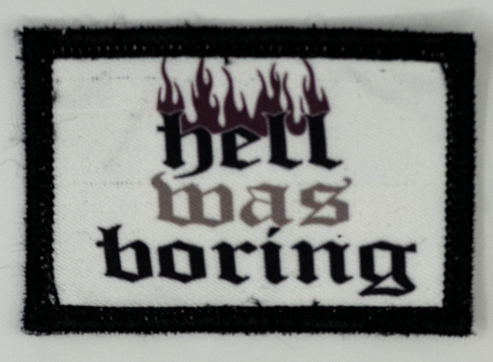 a patch with the words hell dogs boring on it
