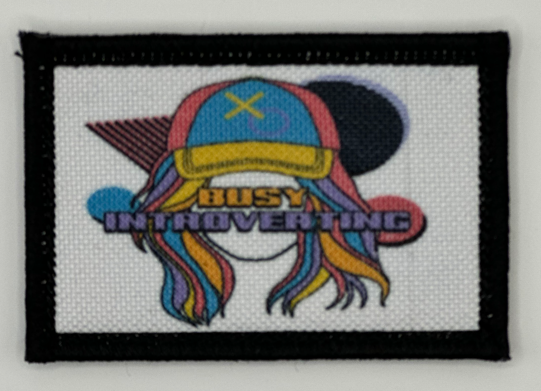 a patch with a picture of a person wearing a hat