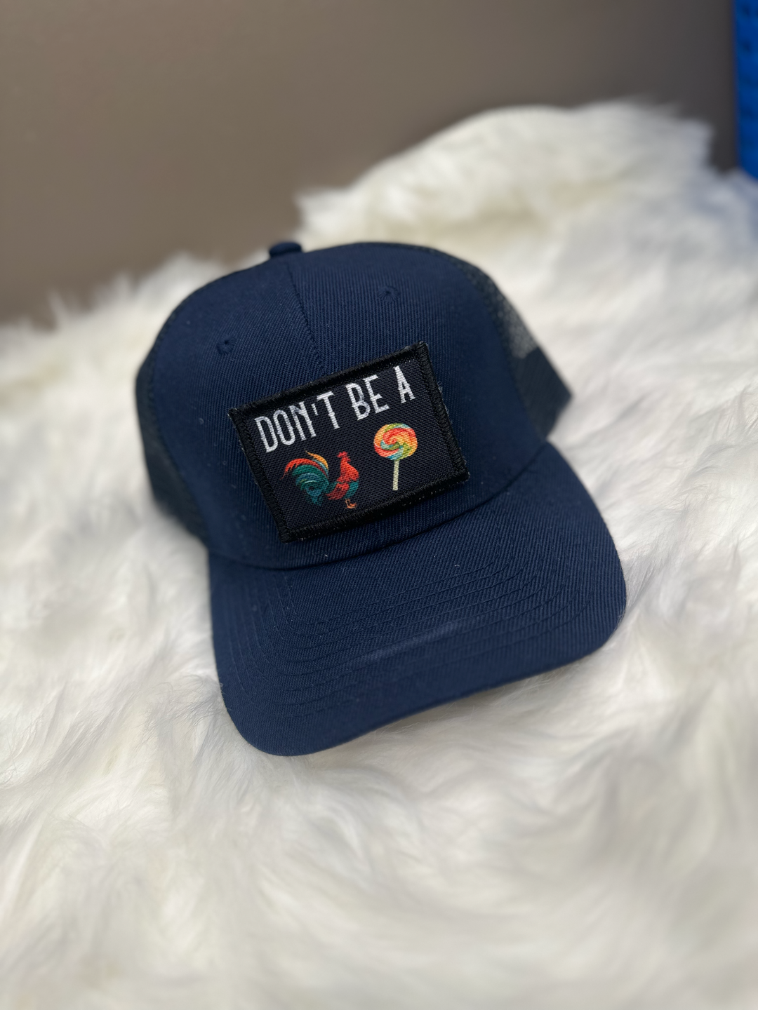 a hat that says don&#39;t be a sucker on it