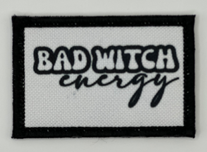 a patch with the words bad witch energy on it
