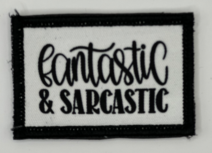 a black and white patch with the words fantastic and sarcastic