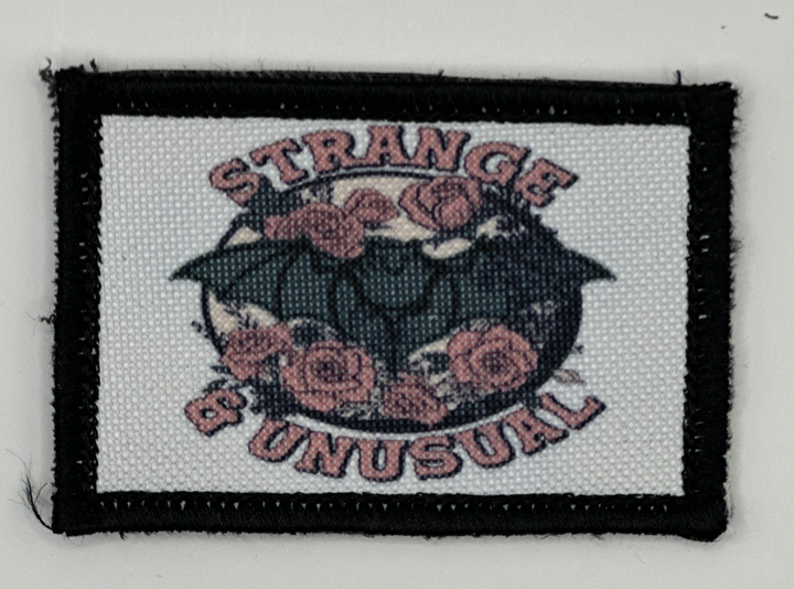 a picture of a patch with flowers on it