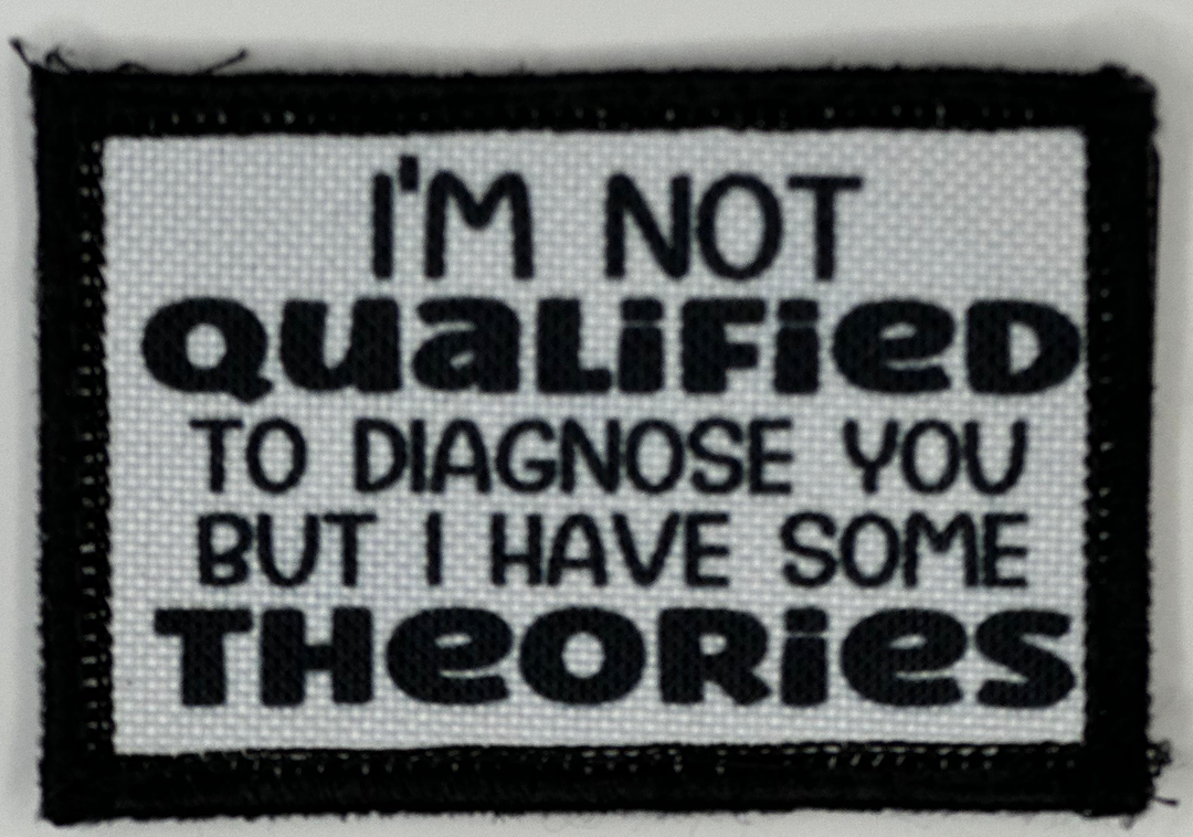 a black and white sign that says i'm not qualified to diagnose