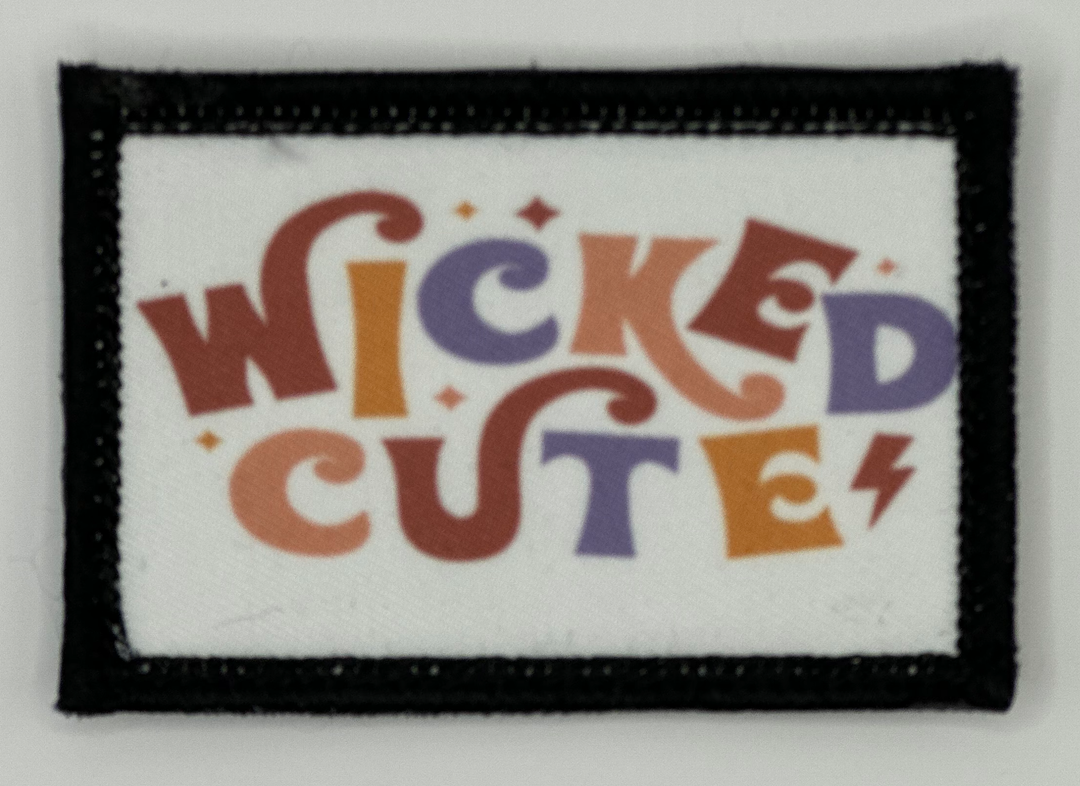 a patch with the words wicked cute on it