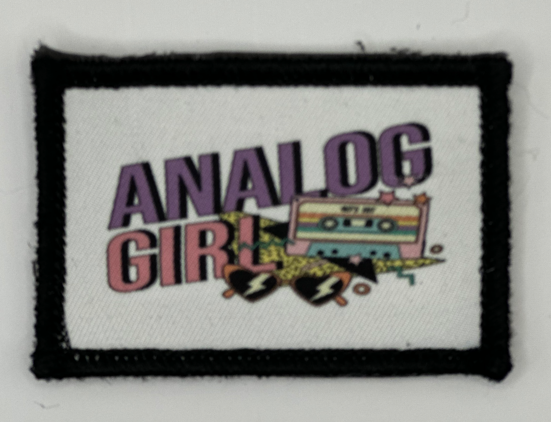 a patch with the words analog girl on it