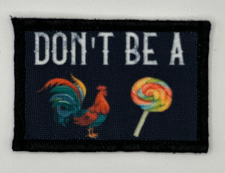 a patch that says don&#39;t be a rooster and a lollipop
