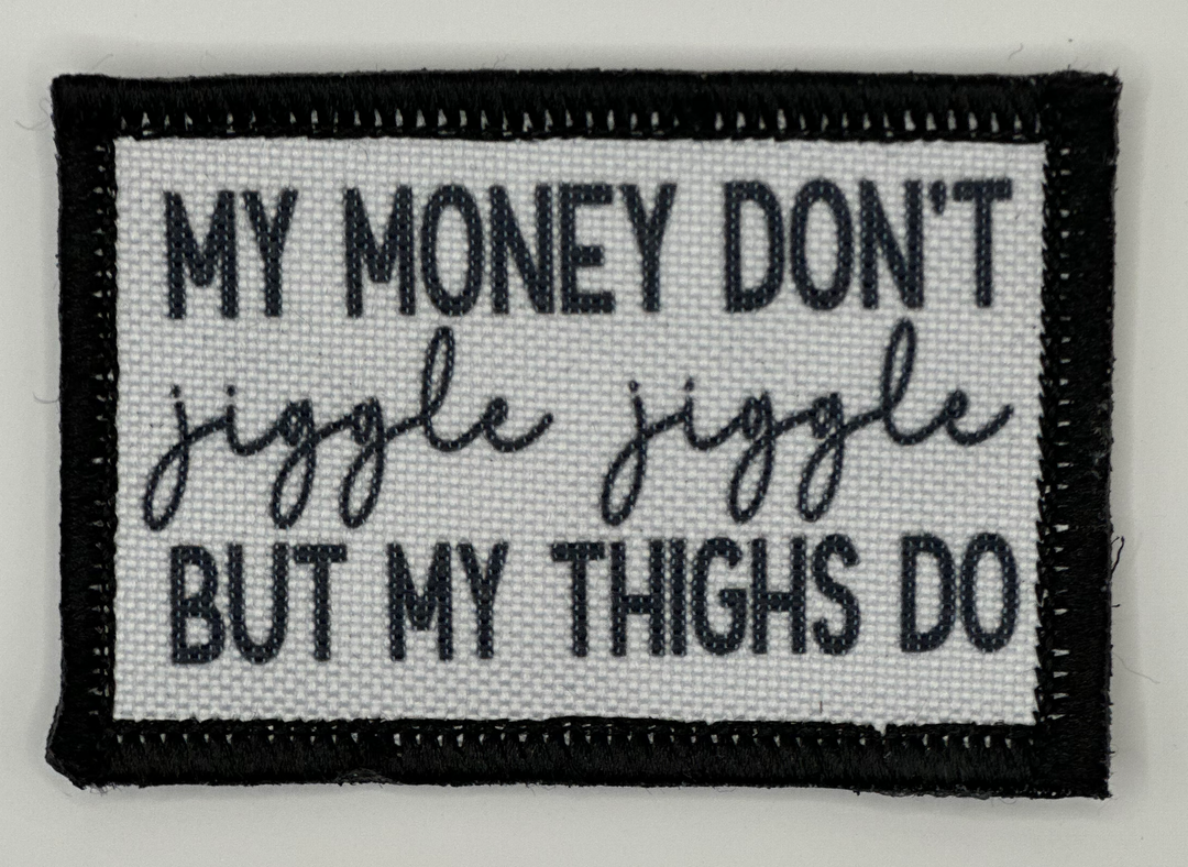 a black and white patch that says, my money don't judge juggle