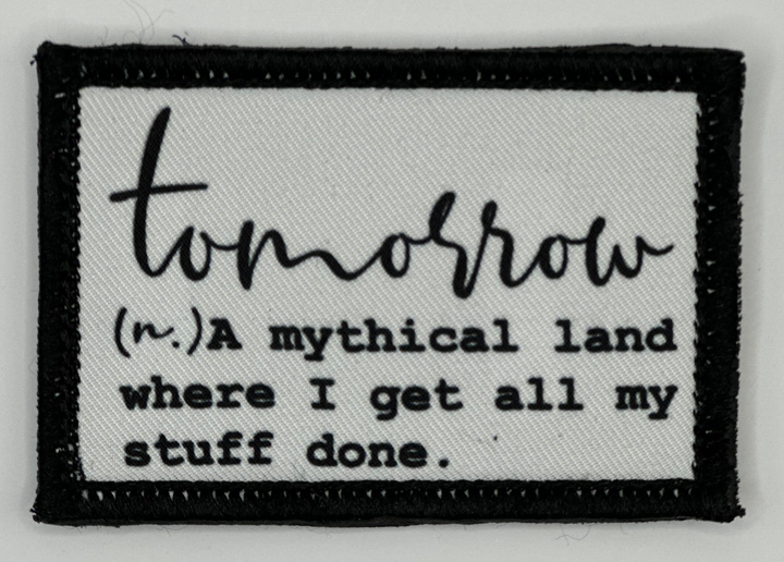 a black and white patch that says tomorrow