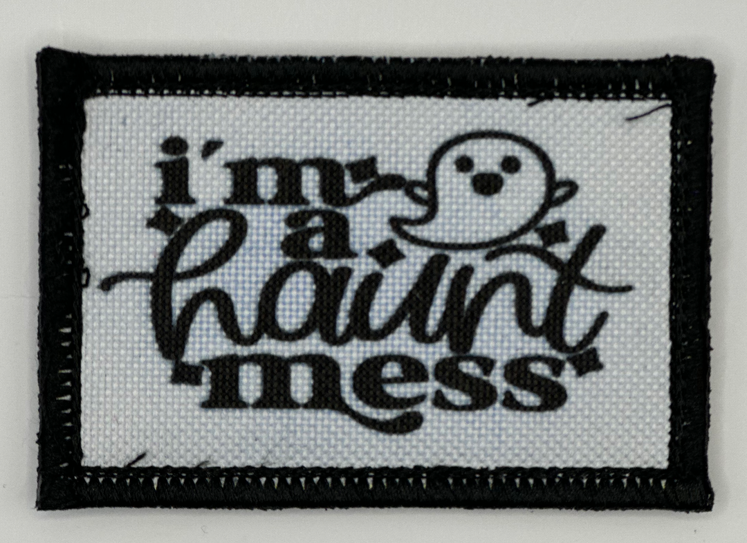 a black and white patch with the words i'm a round mess on it