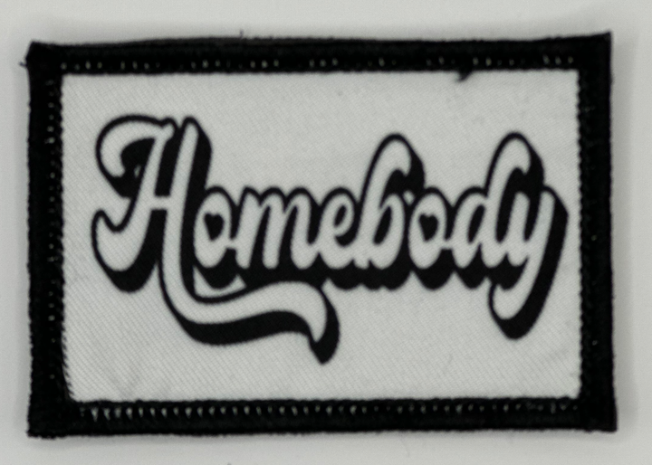 a black and white patch with the word andy on it