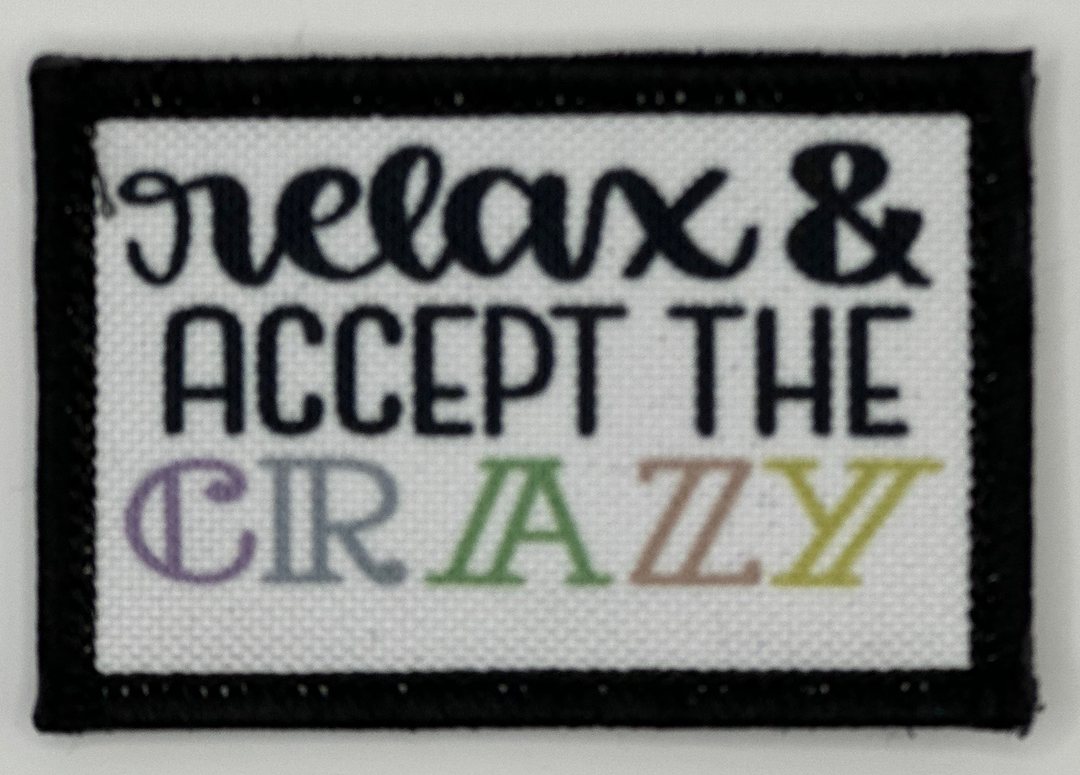 a black and white sign that says relax and accept the crazy