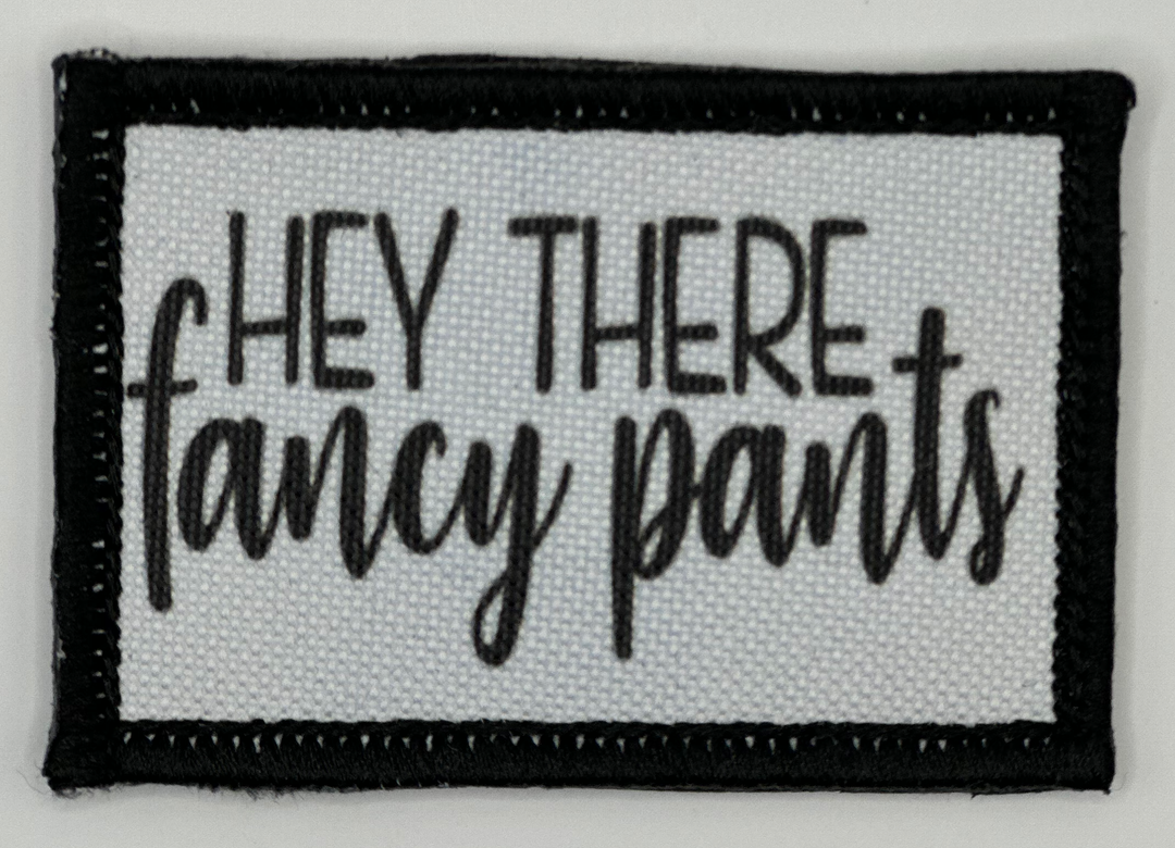 a patch that says hey there fancy pants