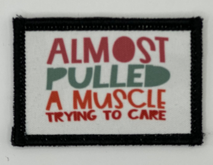 a patch that says almost pulled a muscle trying to care